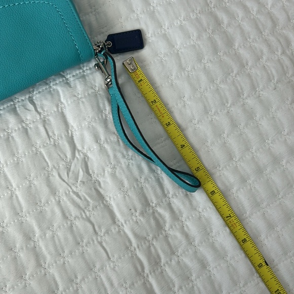 NWOT Coach large flap wristlet. - Picture 10 of 10